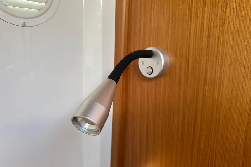 Slide: The Image of Adjustable reading light on Sargo 31OB 2025 boat, mounted on wooden panel. - 44