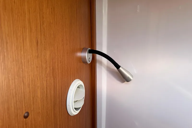 Slide: The Image of Flexible reading light and air vent on Sargo 31OB 2025 wooden interior. - 45