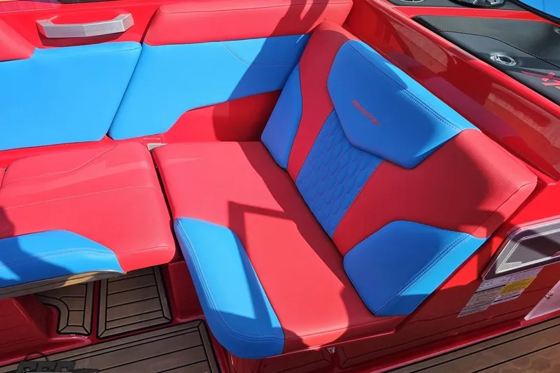 Slide: The Image of Red and blue seating on 2022 MasterCraft XT24 boat, showcasing modern design and comfort. - 53