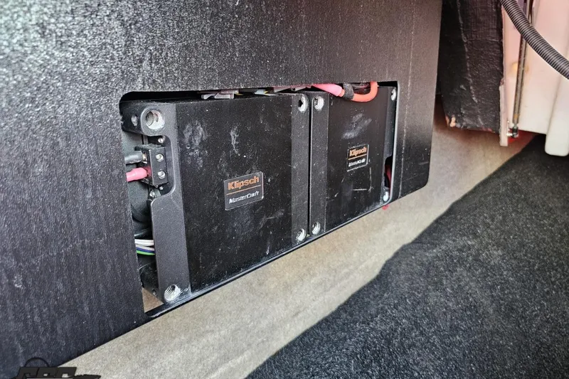 Slide: The Image of Klipsch audio system in 2022 MasterCraft XT24 boat, featuring integrated wiring and components. - 55