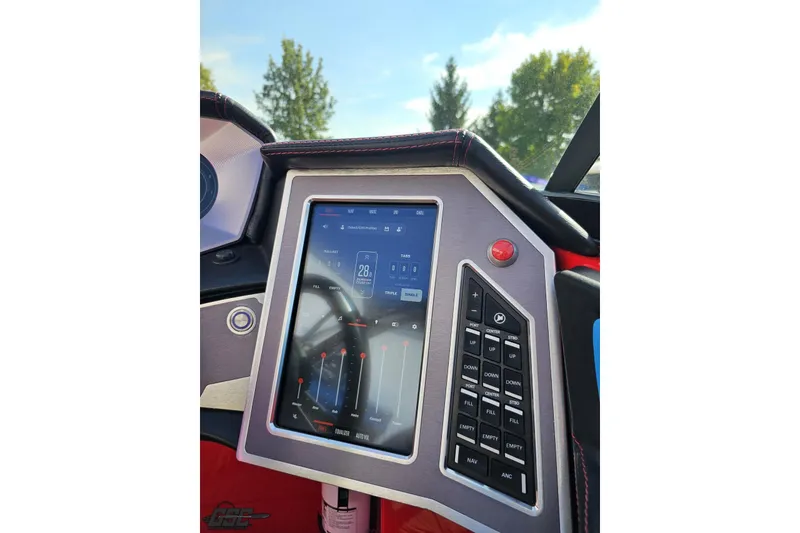 Slide: The Image of Dashboard of 2022 MasterCraft XT24 boat with touchscreen controls and buttons. - 71