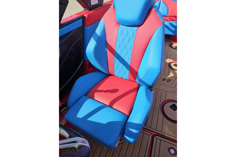 Slide: The Image of Red and blue seat in 2022 MasterCraft XT24 boat, showcasing modern design and comfort. - 93