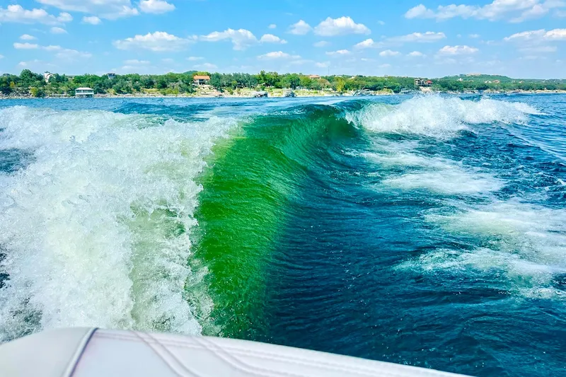 Slide: The Image of Wake created by 2017 Nautique Super Air Nautique G23 on a sunny lake. - 13
