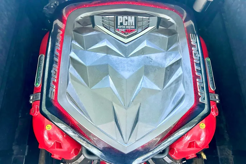 Slide: The Image of 2017 Nautique Super Air Nautique G23 engine with PCM branding, featuring a geometric design. - 25