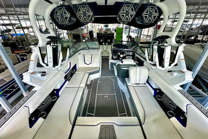 Slide: The Image of 2017 Nautique Super Air Nautique G23 interior with premium seating and advanced audio system. - 28