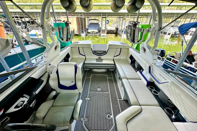 Slide: The Image of 2017 Nautique Super Air Nautique G23 boat interior with spacious seating and modern design. - 29
