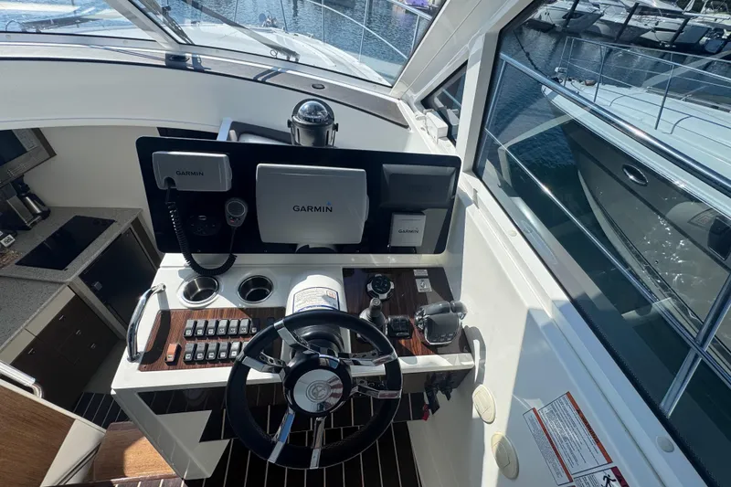 Slide: The Image of Helm of 2012 Cruisers Yachts 41 Cantius with Garmin navigation system. - 12