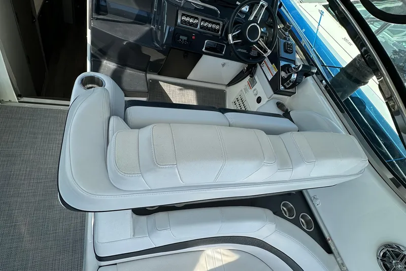 Slide: The Image of 2019 Formula 37 Performance Cruiser cockpit with white seating and modern controls. - 9