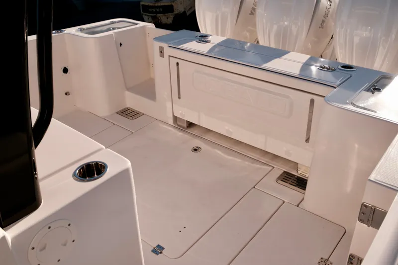 Slide: The Image of 2024 Robalo R360 Center Console boat interior with sleek design and modern features. - 11