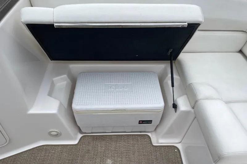Slide: The Image of 2008 Regal 2700 Bowrider interior with Igloo cooler under seat storage. - 10