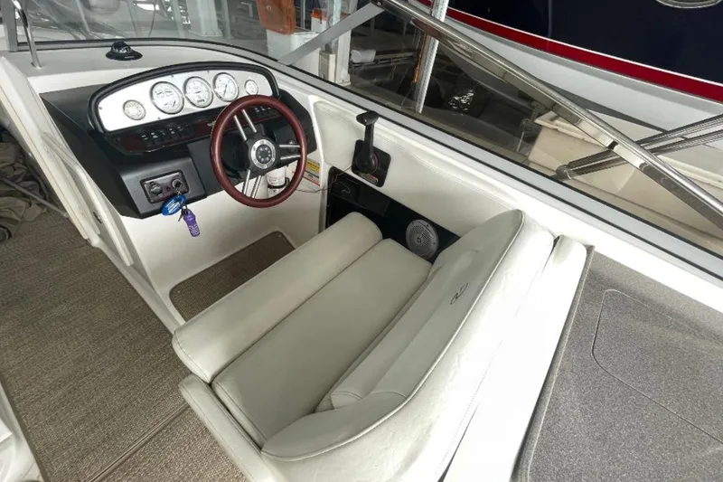 Slide: The Image of 2008 Regal 2700 Bowrider cockpit with steering wheel and instrument panel. - 6