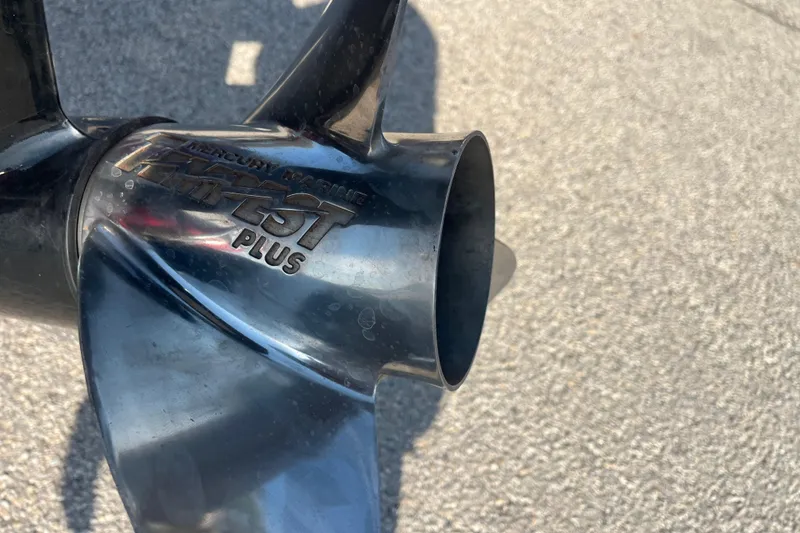 Slide: The Image of 2015 Nitro Z-8 boat on trailer, red and white, with Minn Kota trolling motor. - 14