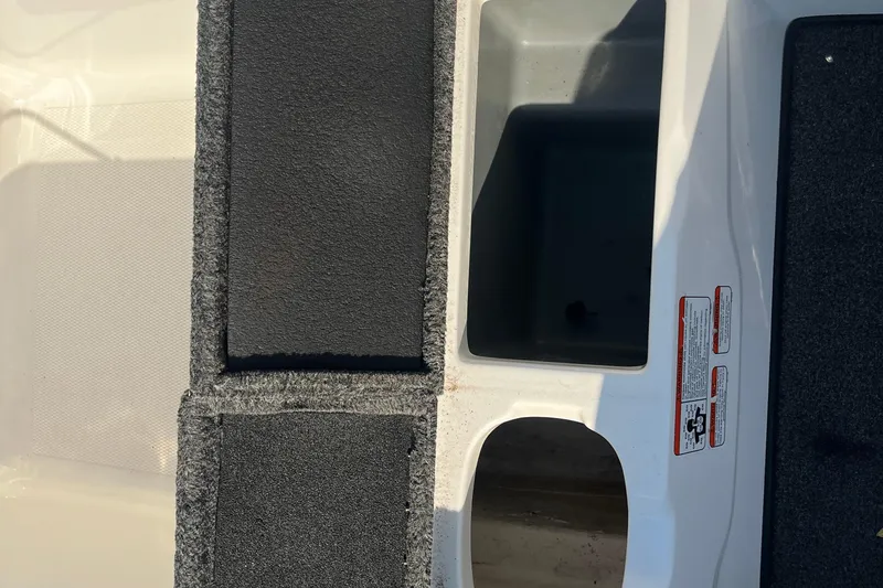 Slide: The Image of Control panel of a 2015 Nitro Z-8 boat with switches and buttons. - 29