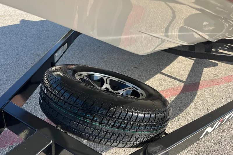 Slide: The Image of 2015 Nitro Z-8 boat with Mercury 250 Pro XS engine, parked outdoors. - 3