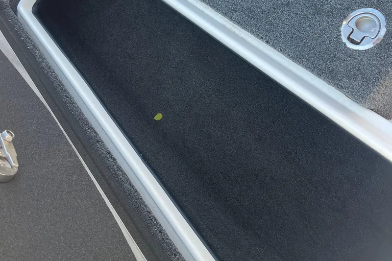 Slide: The Image of 2015 Nitro Z-8 boat on trailer, close-up view of hull and tire. - 31