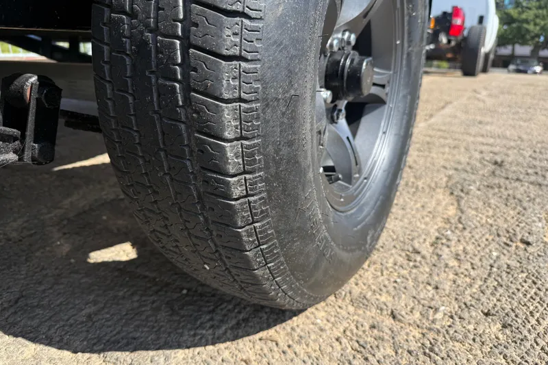 Slide: The Image of 2015 Nitro Z-8 boat with Mercury Pro XS engine, parked outdoors. - 56