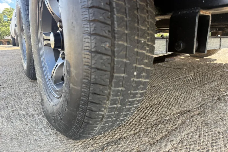 Slide: The Image of 2015 Nitro Z-8 boat with Mercury Pro XS engine at a lakeside launch. - 62