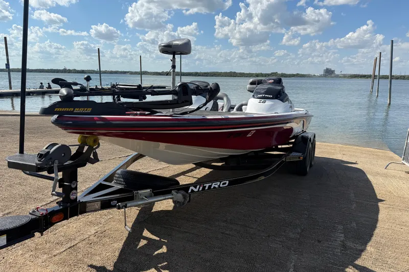Slide: The Image of 2015 Nitro Z-8 boat interior with seats and steering wheel. - 67
