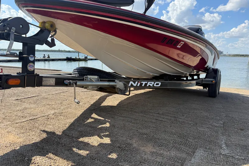 Slide: The Image of 2015 Nitro Z-8 boat with trolling motor and fish finder on deck. - 68