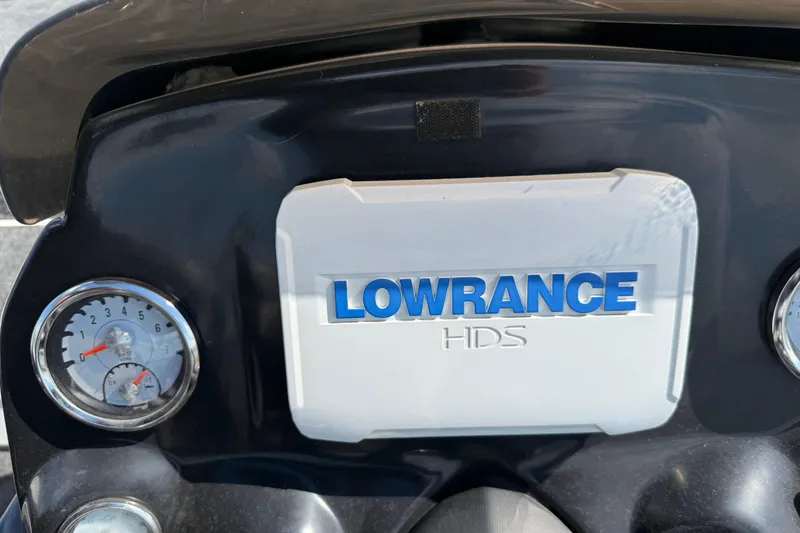 Slide: The Image of Control panel of a 2015 Nitro Z-8 boat with switches and key ignition. - 78