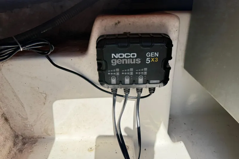 Slide: The Image of Lowrance HDS7 sonar display on a 2015 Nitro Z-8 boat, showing depth and frequency data. - 83