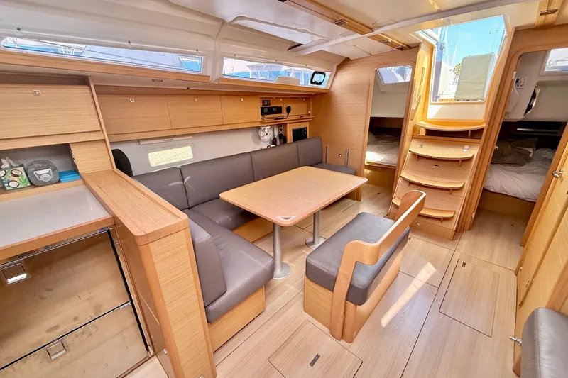 Slide: The Image of Modern kitchen interior of 2020 Dufour 430 yacht with wood cabinetry and stainless steel sink. - 22