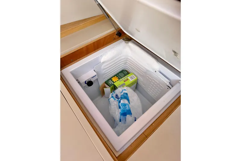 Slide: The Image of Anchor locker of a 2020 Dufour 430 sailboat with ropes and chain. - 34