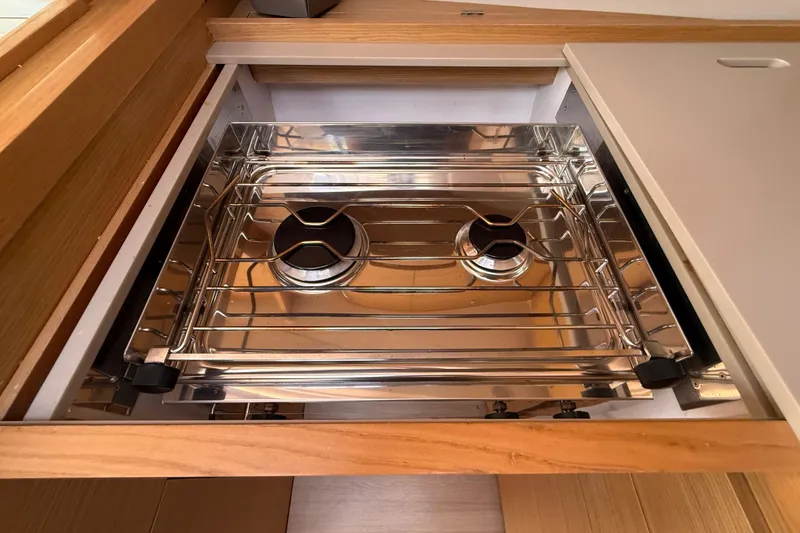 Slide: The Image of Interior of 2020 Dufour 430 yacht with wooden steps and cozy cabins. - 35