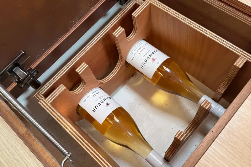 Slide: The Image of Control panel of a 2020 Dufour 430 yacht with various system switches. - 43