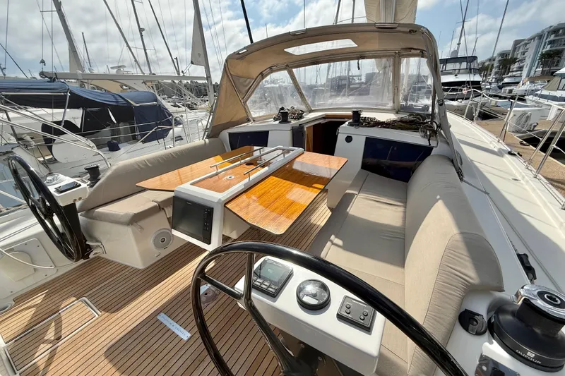 Slide: The Image of Luxurious 2020 Dufour 430 sailboat cockpit with teak decking and modern steering wheel. - 8