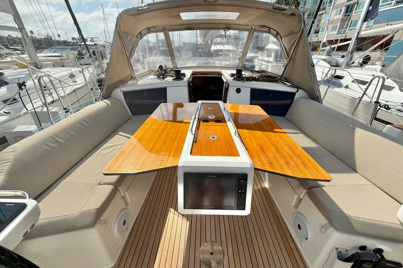 Slide: The Image of 2020 Dufour 430 yacht cockpit with dual steering wheels and teak flooring. - 9
