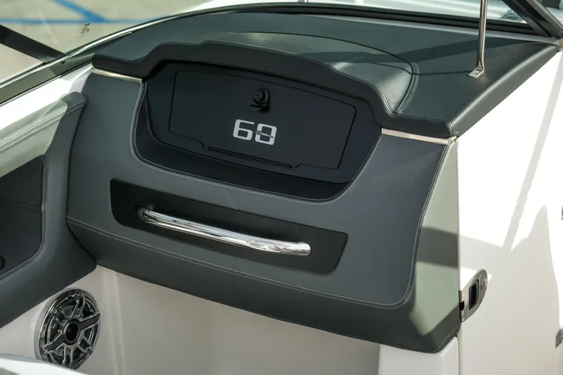 Slide: The Image of 2025 Chaparral 247 SSX boat dashboard with sleek design and modern features. - 12