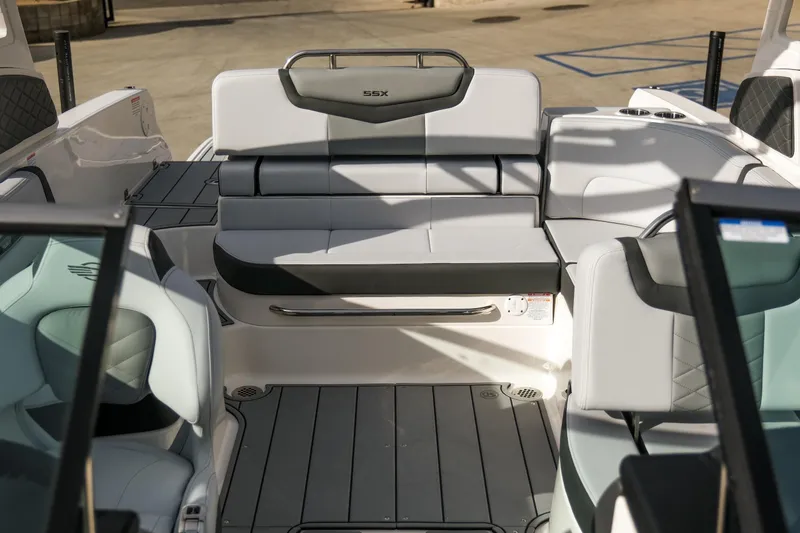 Slide: The Image of 2025 Chaparral 247 SSX boat interior with sleek seating and modern design. - 19