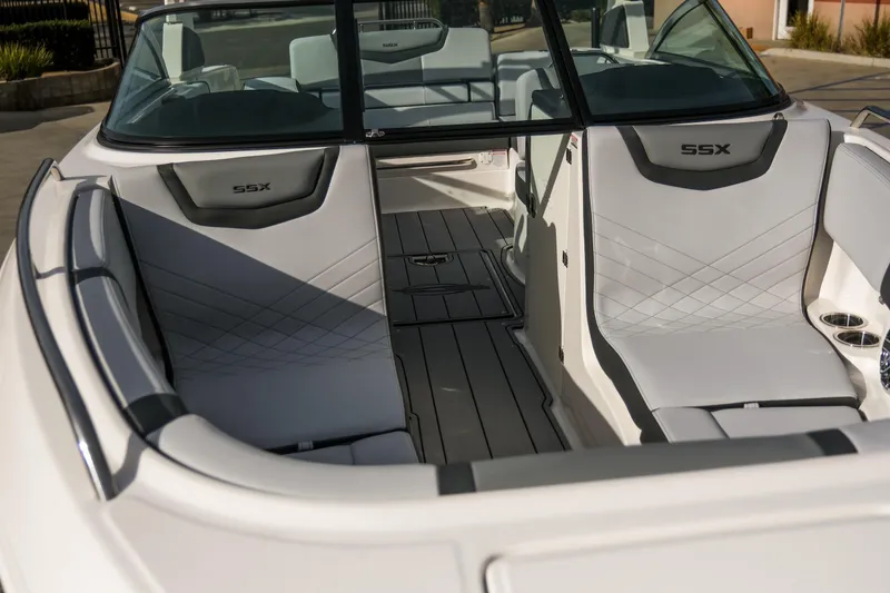 Slide: The Image of 2025 Chaparral 247 SSX boat interior with sleek seating and modern design. - 4