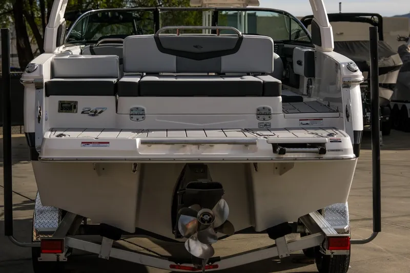 Slide: The Image of 2025 Chaparral 247 SSX boat rear view, showcasing sleek design and modern features. - 7
