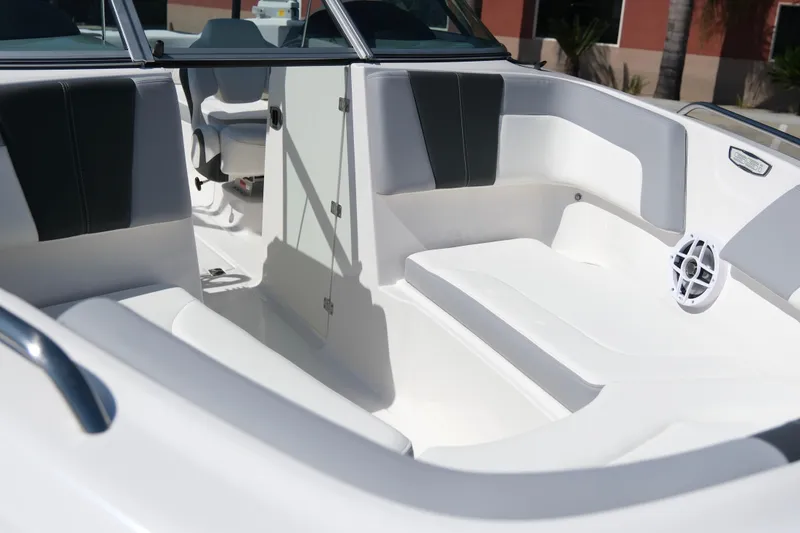 Slide: The Image of 2025 Chaparral 23 SSi boat interior with sleek seating and modern design. - 10