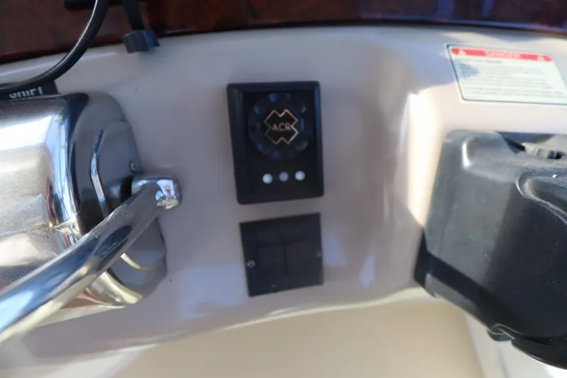 Slide: The Image of Control panel of a 2000 Sea Ray 460 Sundancer boat, featuring ACR system. - 22