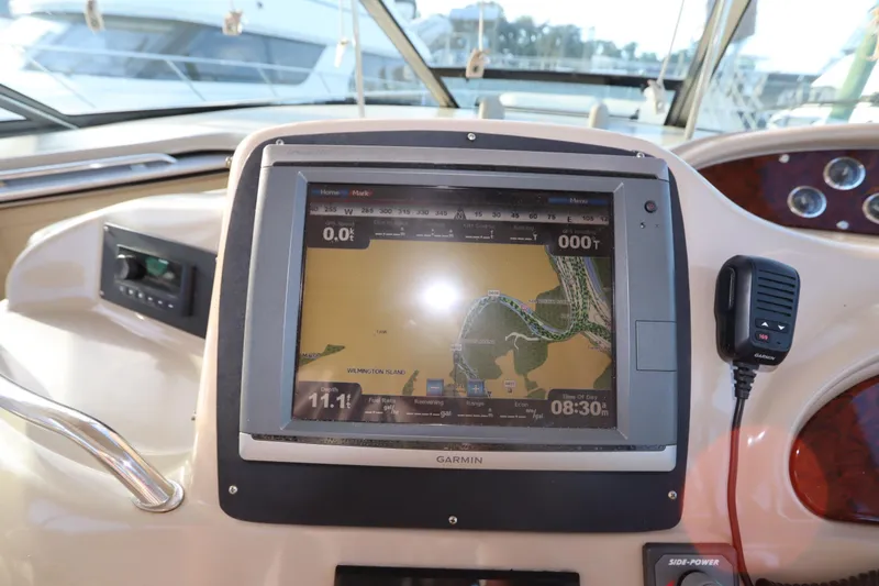 Slide: The Image of Garmin navigation system on 2000 Sea Ray 460 Sundancer yacht dashboard. - 28