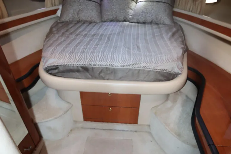 Slide: The Image of Luxurious cabin interior of 2000 Sea Ray 460 Sundancer yacht with cozy bed. - 38