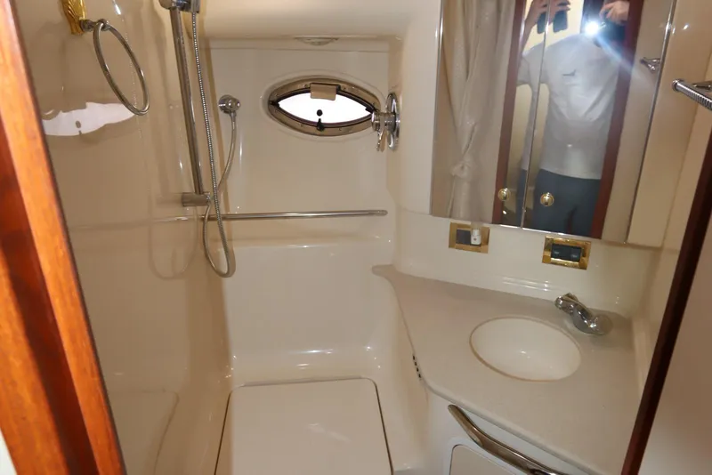 Slide: The Image of Bathroom interior of 2000 Sea Ray 460 Sundancer yacht with shower and sink. - 41