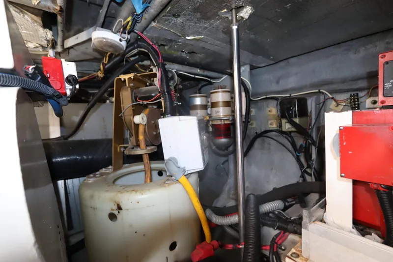 Slide: The Image of Engine room of 2000 Sea Ray 460 Sundancer with wiring and equipment. - 51