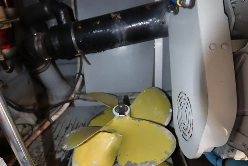 Slide: The Image of Engine room of 2000 Sea Ray 460 Sundancer with visible propeller and machinery. - 55