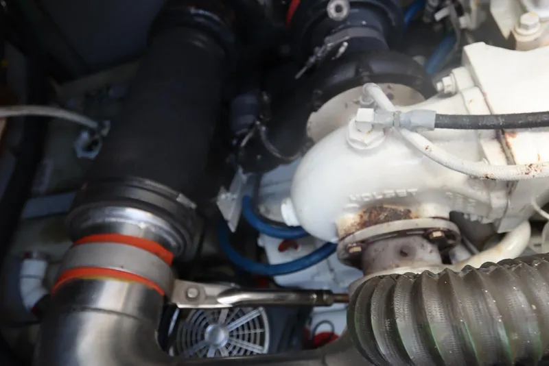 Slide: The Image of Engine components of a 2000 Sea Ray 460 Sundancer boat. - 61