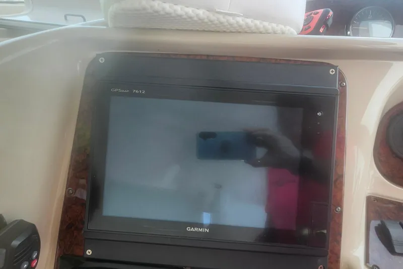 Slide: The Image of Garmin GPSMap 7612 on 2004 Sea Ray 480 Motor Yacht dashboard. - 11