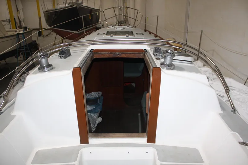 Slide: The Image of 1986 J Boats J/28 sailboat interior view with open cabin entrance. - 15
