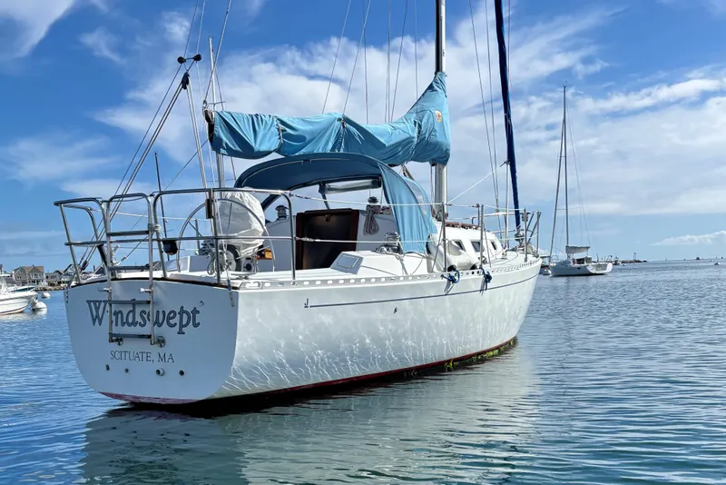Slide: The Image of 1986 J Boats J/28 sailboat "Windswept" anchored in Scituate, MA harbor. - 2