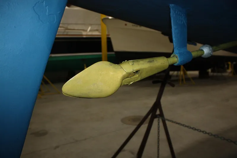 Slide: The Image of 1986 J Boats J/28 sailboat propeller in a workshop setting. - 21