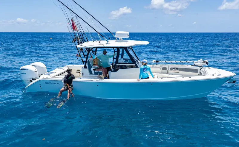 Slide: The Image of Cobia 305 Center Console 2026 - 2