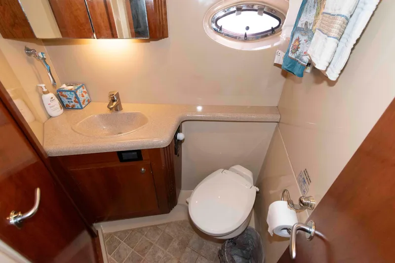 Slide: The Image of Luxurious bathroom in 2005 Cruisers Yachts 405 Express Motoryacht with modern fixtures. - 21