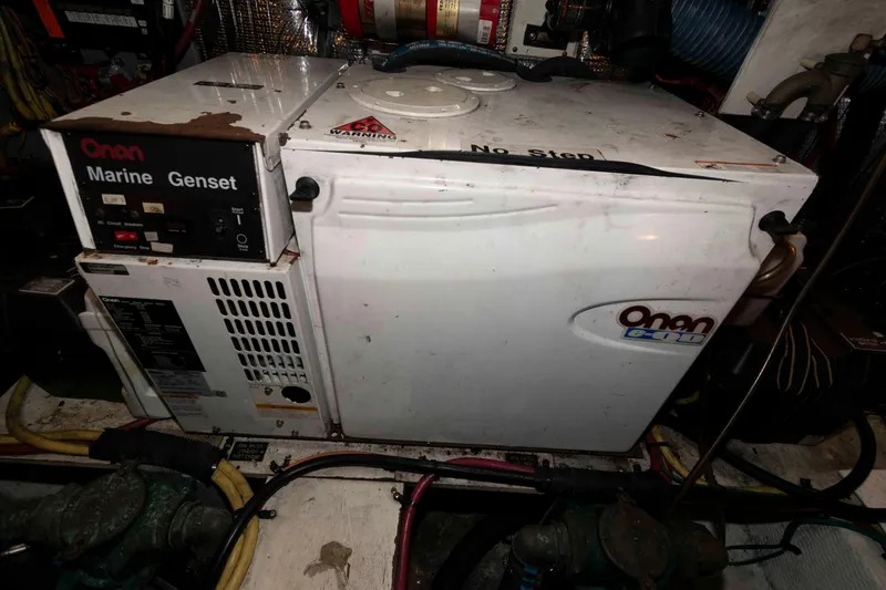 Slide: The Image of Onan marine generator in 2005 Cruisers Yachts 405 Express Motoryacht engine room. - 26